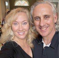 a man and woman posing for a selfie